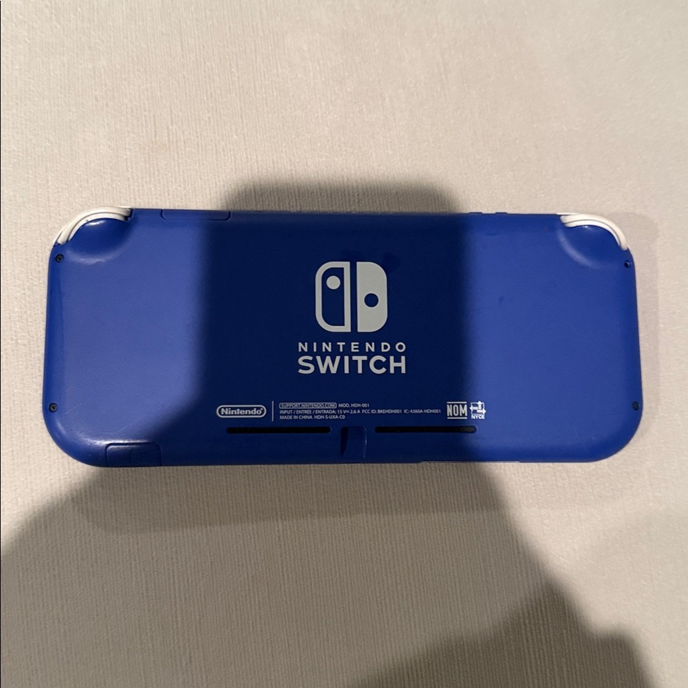 Nintendo Handheld Console in Blue and White - Picture 2 of 2